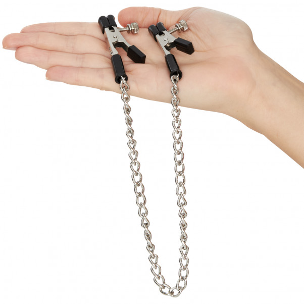 Spartacus Alligator Nipple Clamps and Chain product held in hand 51